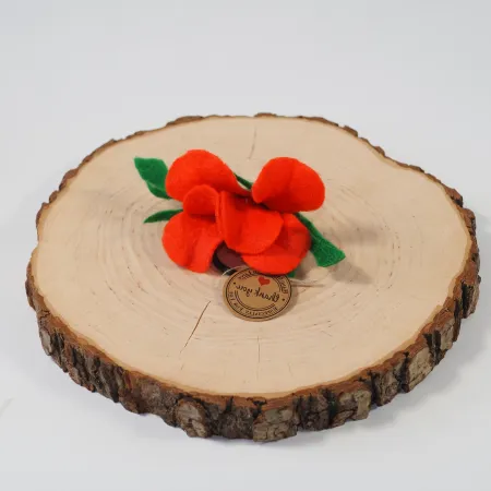 Filcowa kwiat pomarańczowy z gumką do włosów